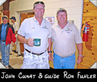 John Cunat tells guide Ron Fuhler how he won the "Master Caster" award