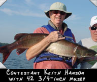 Contestant Keith Hanson with 42 3/4-inch musky, guided by Mike O'Brien