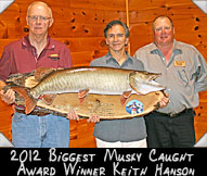 2012 Biggest Musky Caught by a Contestant award winner Keith Hanson (left) with Joe Fittante (center) and WMH VP Don Ladubec (right)