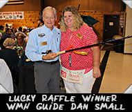 Lucky raffle winner WMH Guide Dan Small shown here with WMH Board member and mainstay Junelle Lone