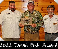 2022 WMH Dead Fish Award winner Phil Lone shown here with WMH Board members Fred Palermo (left) and Jeff Micholic