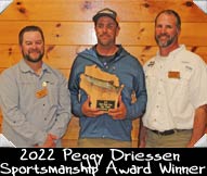 2022 Peggy Driessen Sportsmanship Award winner Justin Tidwell shown here with WMH Board Members Isaac Laube and Dan Scriver (at left)