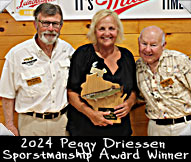 2024 Peggy Driessen Sportsmanship Award Winner Pam McCumber shown here with Board members Jeff Micholic (left) and Ron Rickman